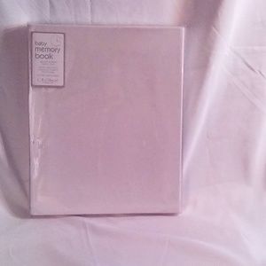 This is a brand new pink leather baby book